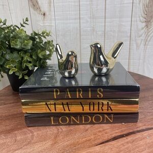 3 Stackbale real blank books and 2 gold birds.